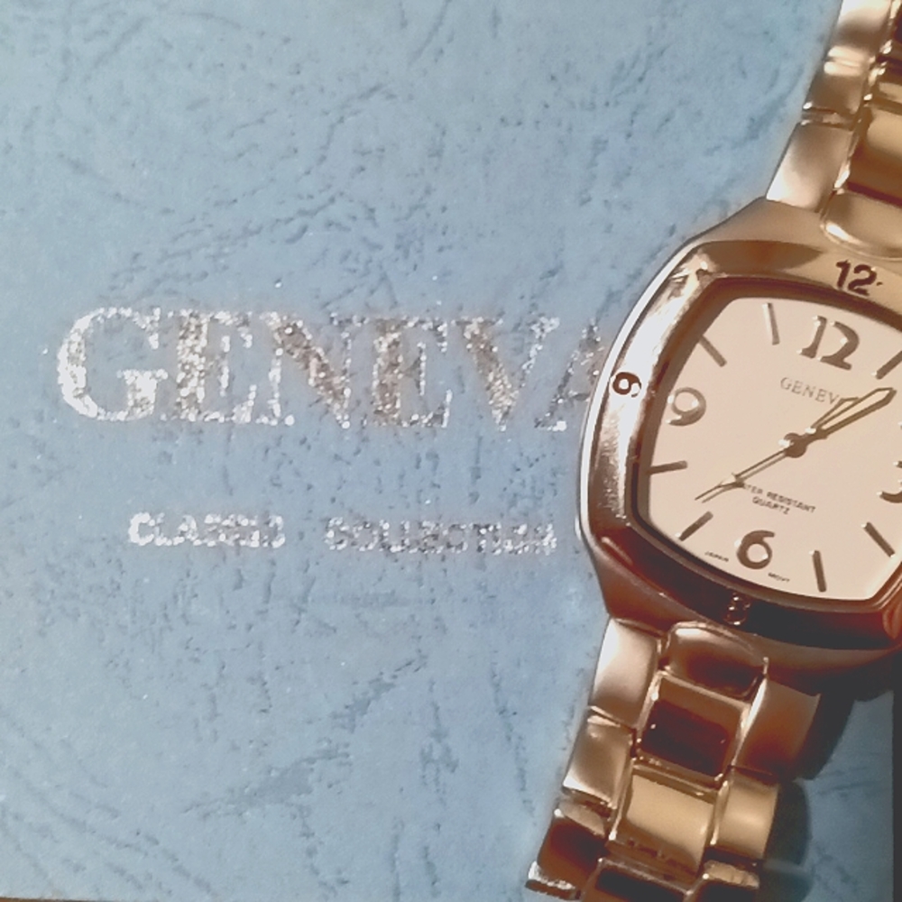 Geneva men's wrist watch with silver colored name